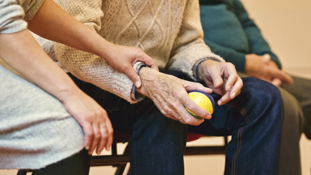 ball, people, old, elderly, man, sitting, woman, holding hand, brown elderly, brown old, elderly, elderly, elderly, elderly, elderly